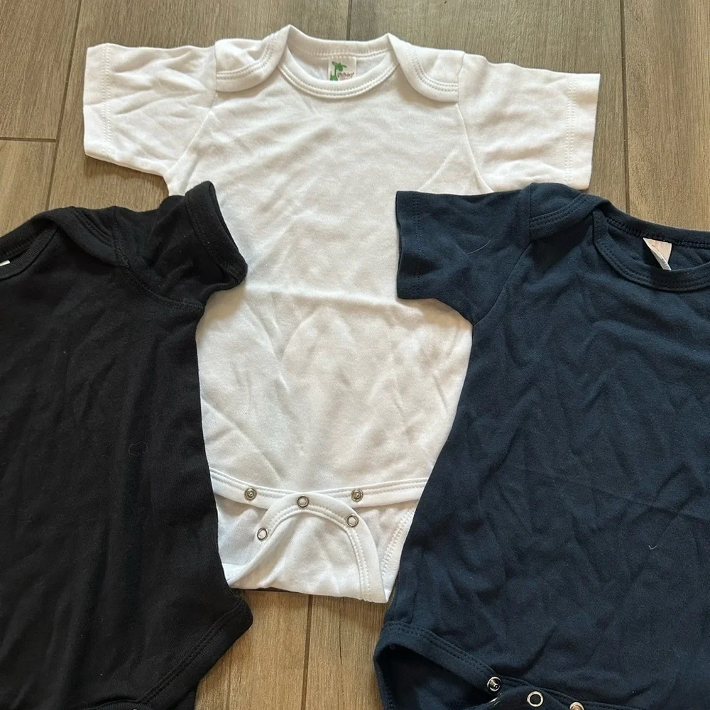 Bulk onesies and matching bib. Laughing giraffe and rabbit skins